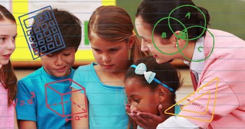 Teacher guiding elementary students through hands-on math lesson with chalkboard doodles