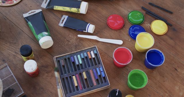 Various Art Supplies on Wooden Table - Download Free Stock Images Pikwizard.com