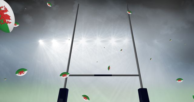 This image captures rugby balls designed with the Welsh flag flying through a stadium, highlighted by bright floodlights. Perfect for conveying the excitement of sports competitions, particularly for events related to Wales. Ideal for use in marketing materials, sports event promotions, or supporting messages for rugby fans and teams.