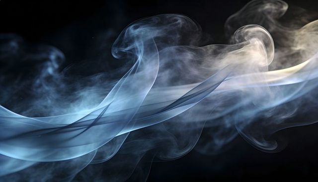 Ethereal blue-gray smoke ribbons flowing across dark backdrop with soft light glow