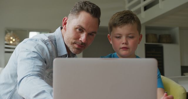 Father Helping Son with Online Learning at Home - Download Free Stock Images Pikwizard.com