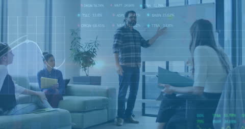 Diverse Business Meeting and Financial Data Visualization