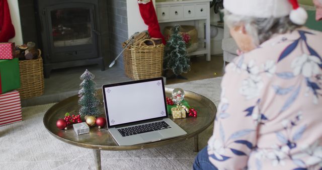 Senior Woman Video Calling Family on Christmas Eve - Download Free Stock Images Pikwizard.com