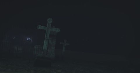 Eerie Graveyard by Night with Cross Tombstones and Lantern - Download Free Stock Images Pikwizard.com
