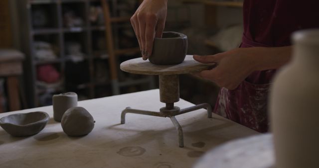 Artist Molding Clay Pottery in Workshop - Download Free Stock Images Pikwizard.com