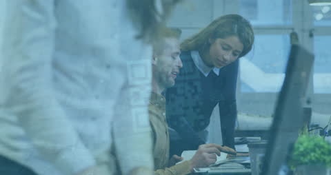 Diverse Team Collaborating Amidst Digital Interface Overlay