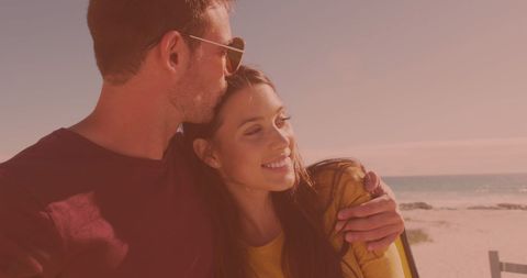 Couple Enjoying a Relaxing Day at the Beach - Download Free Stock Images Pikwizard.com