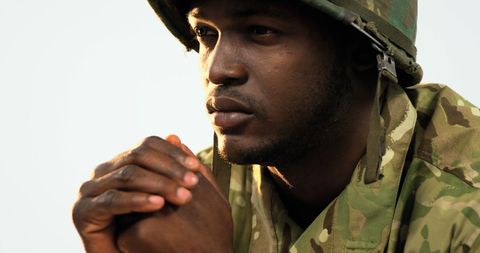 Contemplative Soldier in Camouflage Reflects on Military life - Download Free Stock Images Pikwizard.com