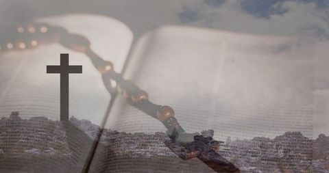 Open bible with wooden rosary and cross silhouette over rocky ridge double exposure