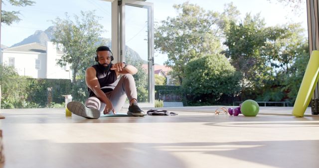 Man in Modern Home Gym Doing Indoor Exercise Routine - Download Free Stock Images Pikwizard.com