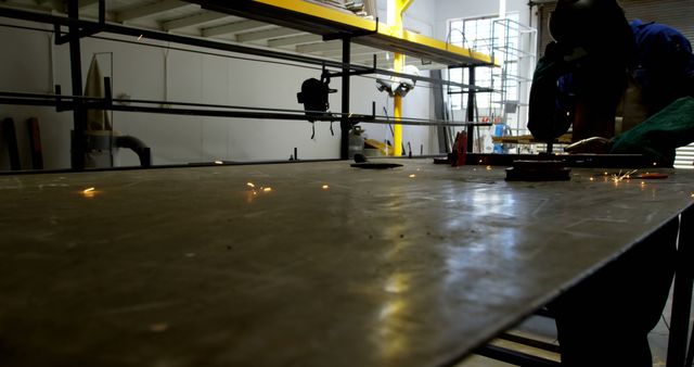 Industrial Worker Cutting Metal with Flying Sparks - Download Free Stock Images Pikwizard.com