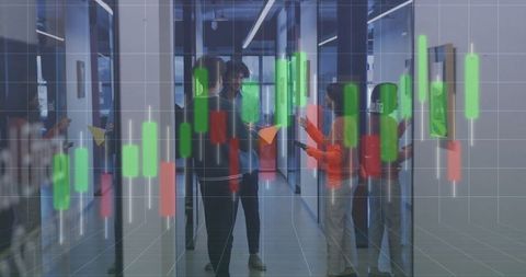 Financial charts overlaying diverse group in office meeting