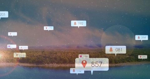 Augmented reality notification bubbles hovering over lakeshore at dusk with location pins