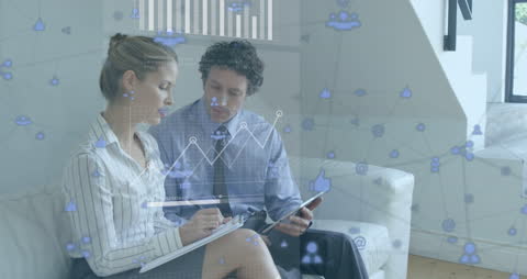 Business Teams Analyzing Digital Data on Tablet