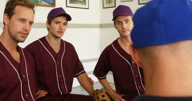 Baseball Team Meeting with Coach in Locker Room - Download Free Stock Images Pikwizard.com