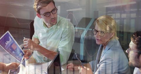 Finance Team Analyzing Data with Innovative Technology