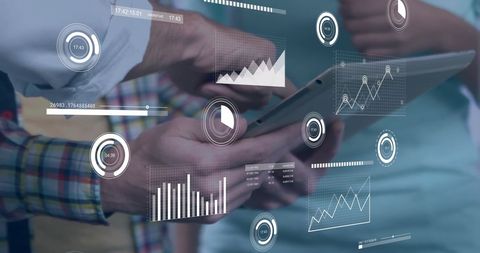 Business Professionals Analyzing Data Visualizations on Tablet