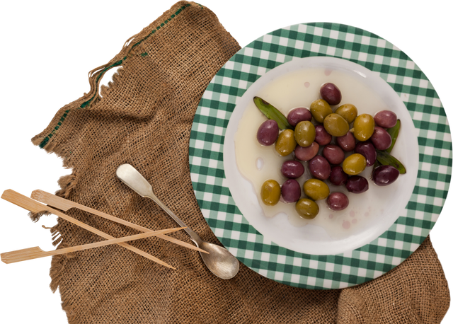 Green and Black Olives in Plate on Textured Burlap with Spoon Offset - Download Free Stock Videos Pikwizard.com