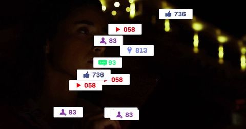 Woman Surrounded By Social Media Icons in a Dark Room Concept