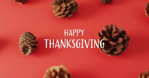 Happy Thanksgiving Greeting with Pine Cones on Red Background - Download Free Stock Images Pikwizard.com