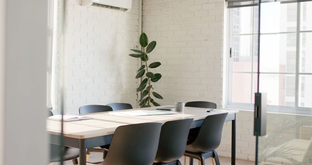 Modern Minimalist Office Meeting Room with Black Chairs and Table - Download Free Stock Images Pikwizard.com