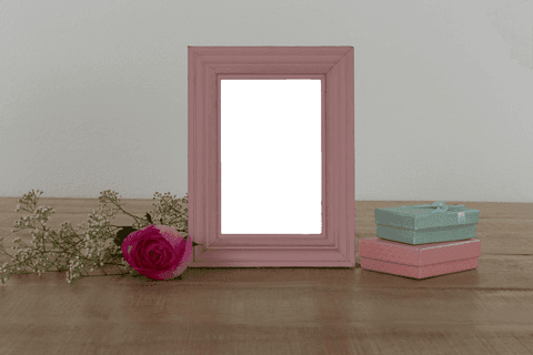 Transparent Photography Frame with Gifts and Fresh Rose on Rustic Wooden Table - Download Free Stock Videos Pikwizard.com