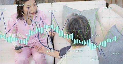 Home nurse measuring blood pressure on sofa with health data overlay and analytics graphs