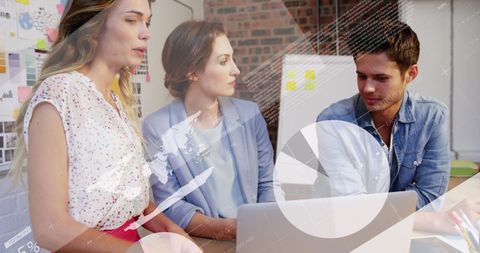 Diverse Team Discussing Work Over Laptop with Data Overlay in Office