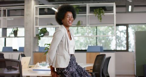Confident african american professional in modern office