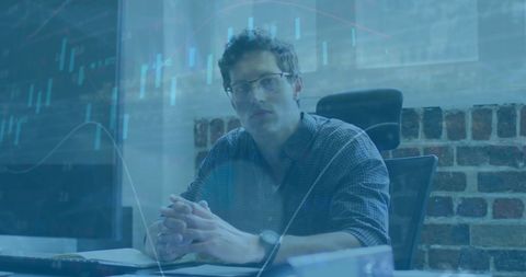 Businessman Processing Financial Data in Modern Office Environment