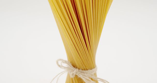 Bundle of Uncooked Spaghetti Tied with String - Download Free Stock Images Pikwizard.com