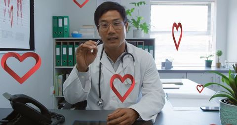 Consulting doctor providing remote healthcare services in office