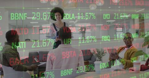 Business Team Strategizing with Financial Data Overlay in Modern Office