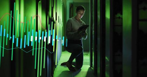 Caucasian IT Professional Analyzing Data in Server Room - Download Free Stock Images Pikwizard.com