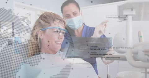 Dentist Guiding Patient Reviewing Digital X-Ray on Tablet in Modern Dental Clinic