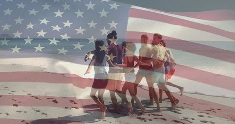 Group walking arm-in-arm on beach with american flag overlay conveying unity and freedom