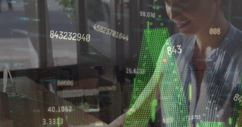 Businesswoman Analyzing Data on Laptop with Digital Interface Overlay