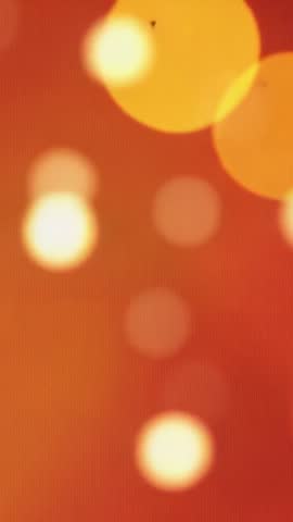 Vertical Amber Bokeh Loop Drifting Warm Light Orbs Glowing Soft Ambient Background