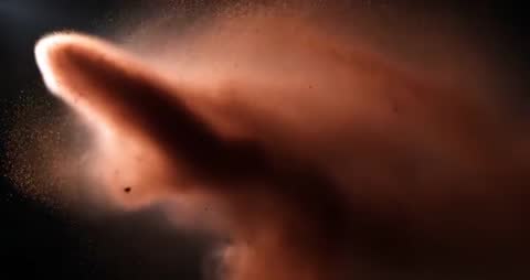Dynamic Dust Cloud Flowing Through Space in Fluid Motion