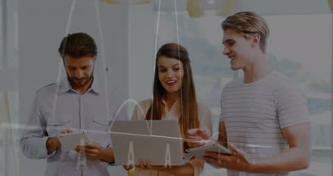 Coworkers Analyzing Data on Digital Tablet Technology