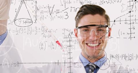 Innovative male scientist analyzing complex mathematical data