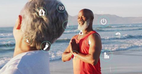 Mature man practicing beach meditation with wellness hud overlays, mindful lifestyle