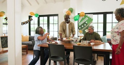 Seniors Enjoying Retirement Celebration at home