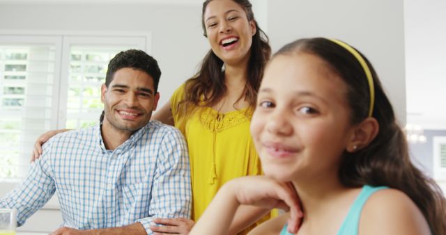 Smiling Hispanic Family Enjoying Quality Time Together at Home - Download Free Stock Images Pikwizard.com