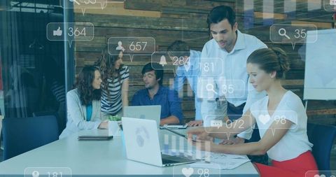 Digital marketing team analyzing social media trends in modern office