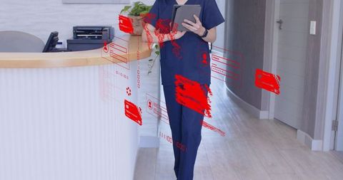 Receptionist in scrubs with digital ui in modern clinic hallway