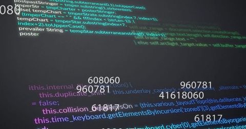 Displaying syntax-highlighted source code with numeric markers on dark developer monitor