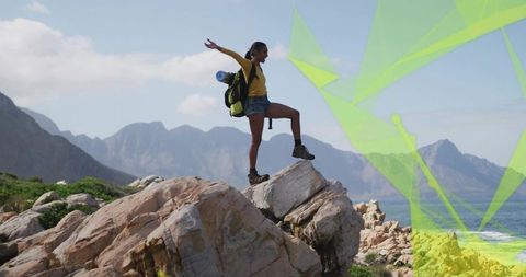 Adventurous Woman Embracing Views on Rocky Mountain Trail