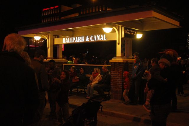 Crowd Gathering at Night Near Train Stop - Download Free Stock Images Pikwizard.com