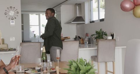 Man Preparing for Festive Celebration at Home